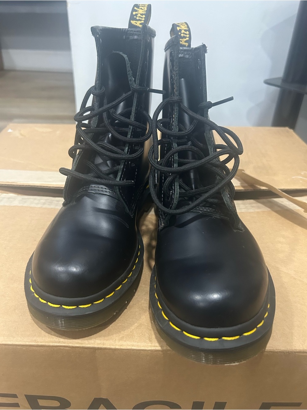 Dr. Martens Black Leather Combat Boots with Yellow Stitching